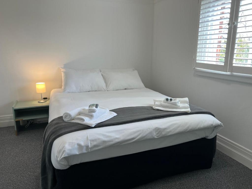 Postel nebo postele na pokoji v ubytování Hotel Concord