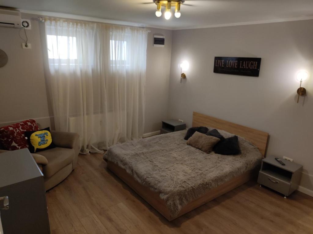 Llit o llits en una habitació de Scandinavian Home in Bucharest City Center