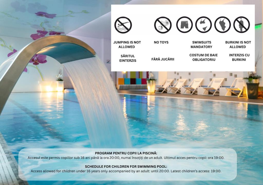 Bazén v ubytování Orhideea Residence & Spa nebo v jeho okolí