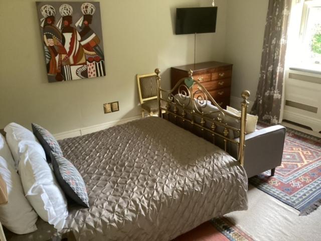 Postel nebo postele na pokoji v ubytování Brynffynnon Boutique Bed and Breakfast