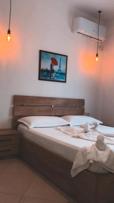 Postel nebo postele na pokoji v ubytování Hotel Apostoli