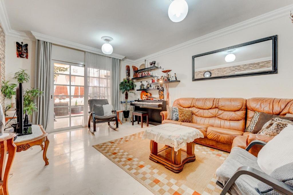 A seating area at Beautiful apartment in Terrazas del Duque I