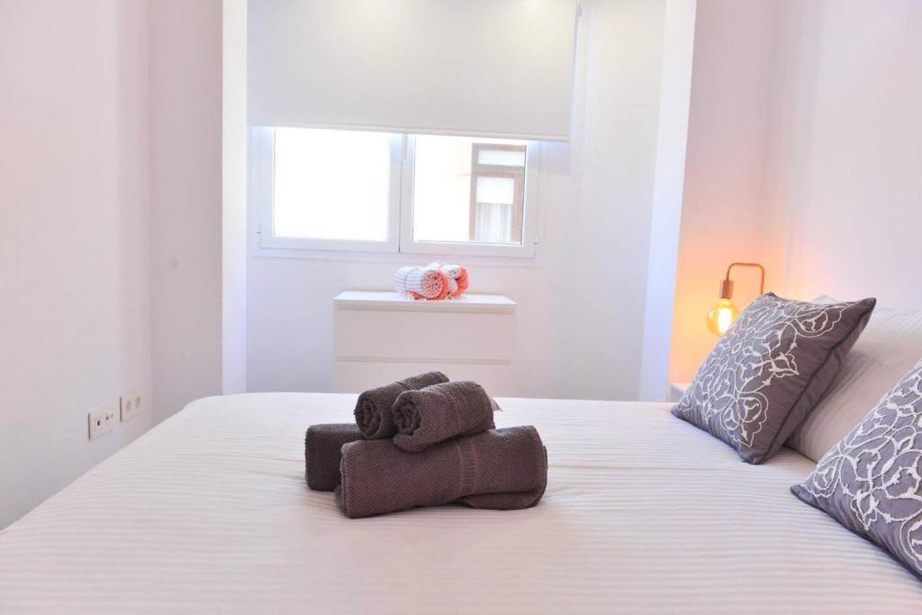 Postel nebo postele na pokoji v ubytování Apartamento Lena