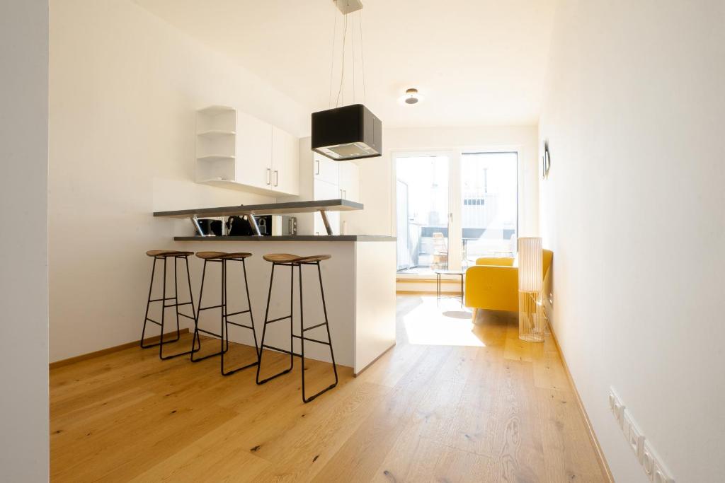 Kuchyňa alebo kuchynka v ubytovaní OrestaLiving - Penthouse with private terrace