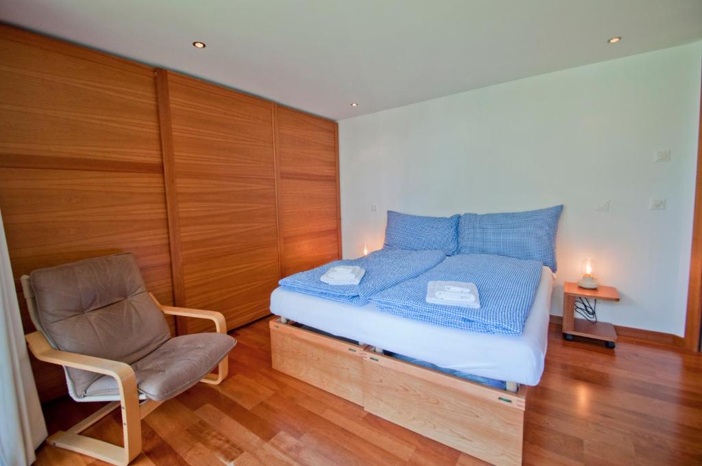 Postel nebo postele na pokoji v ubytování Casa D'Amore, Apartment Lyskamm
