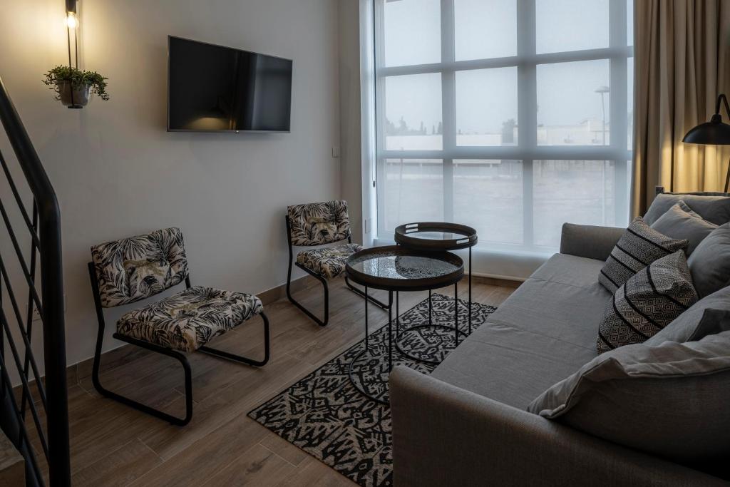 Posedenie v ubytovaní Apartamentos Rosa Velázquez
