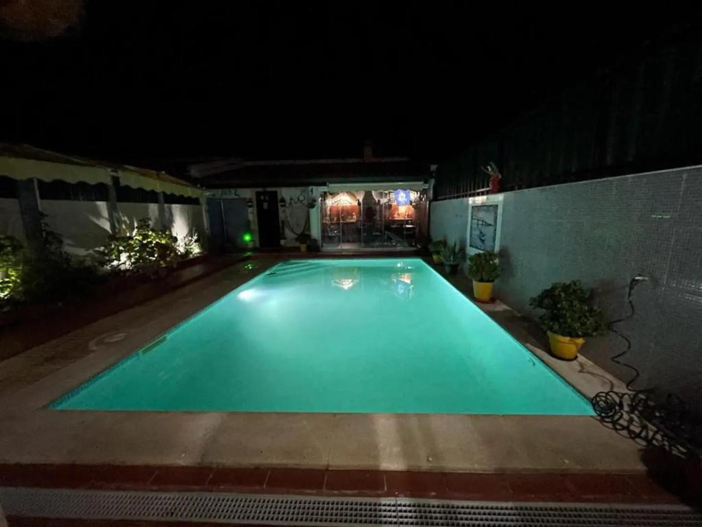 Bazén v ubytování Casa das Flores nebo v jeho okolí