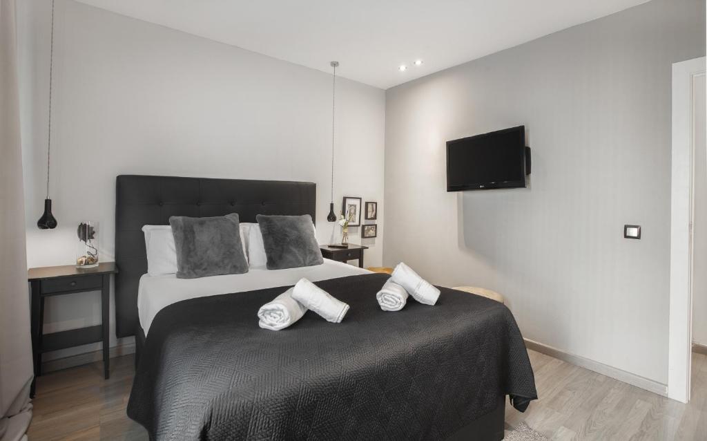 Postel nebo postele na pokoji v ubytování Stay Unique Apartments Aprestadora