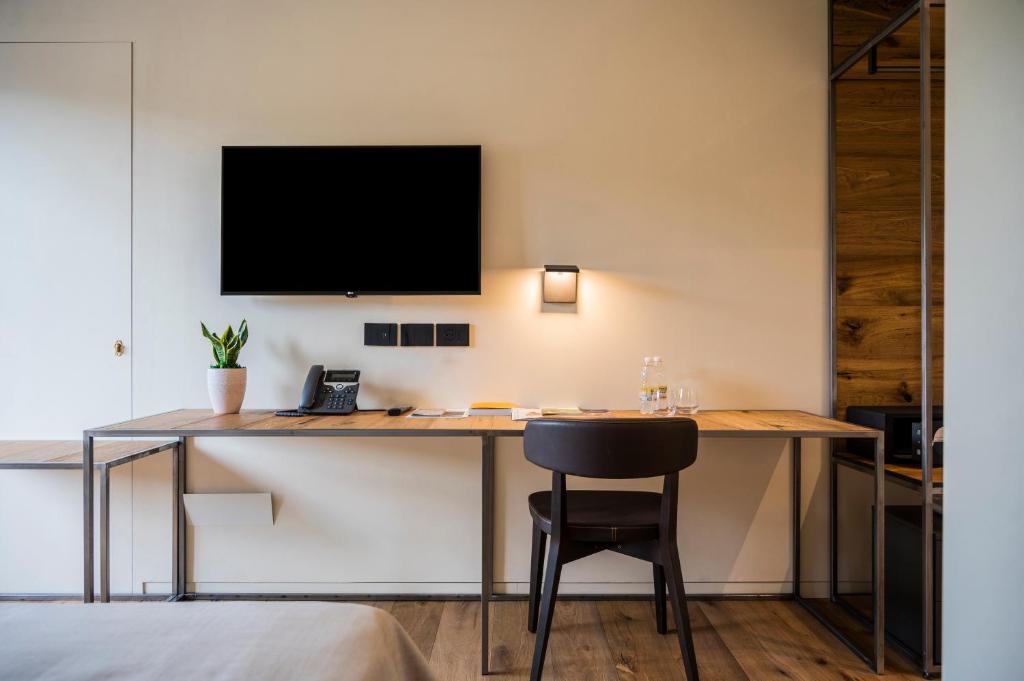 TV a/nebo společenská místnost v ubytování Bihotel