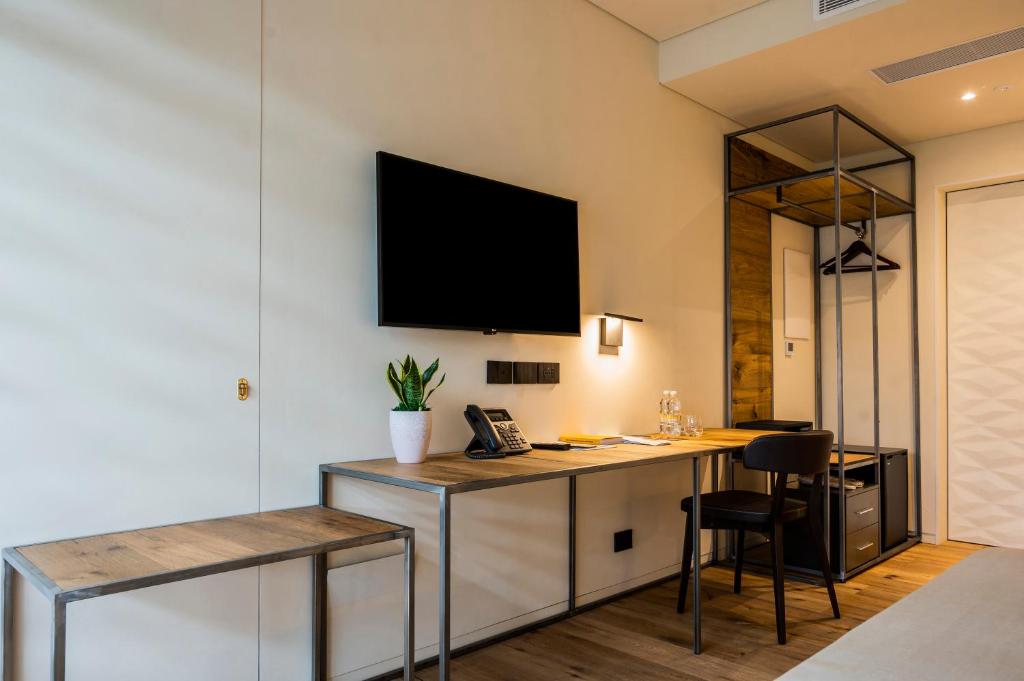 TV a/nebo společenská místnost v ubytování Bihotel