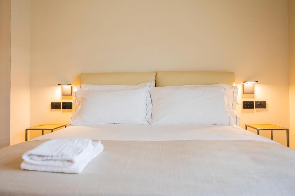 Postel nebo postele na pokoji v ubytování Bihotel