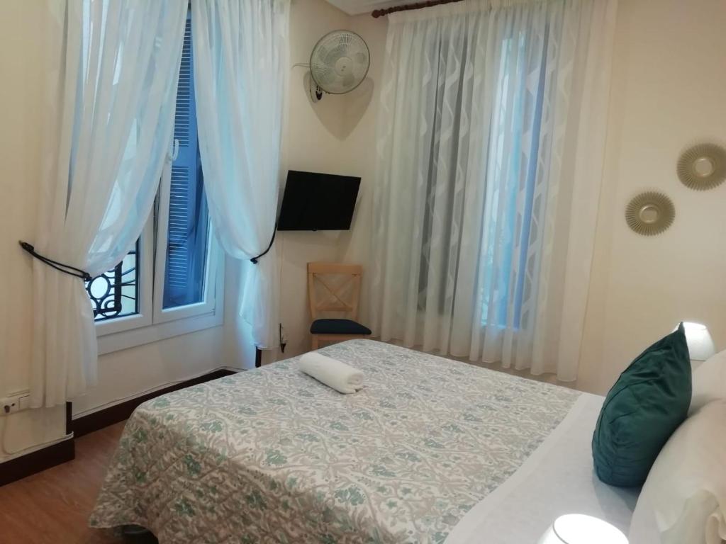 Cama o camas de una habitación en Pensión San Jerónimo