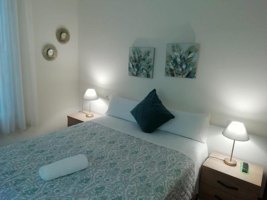 Cama o camas de una habitación en Pensión San Jerónimo