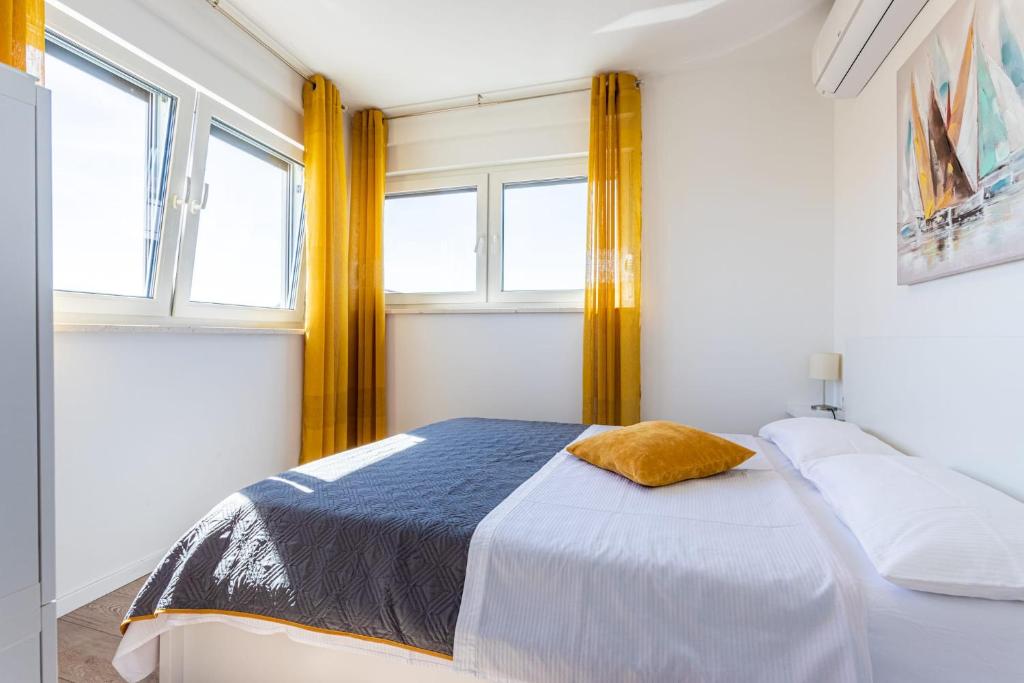 Posteľ alebo postele v izbe v ubytovaní Ferienhaus MAESTRAL - Kastel Kambelovac