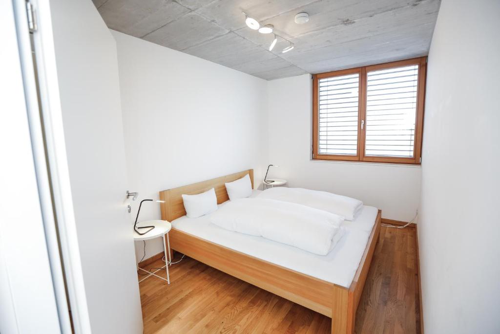 Postel nebo postele na pokoji v ubytování Gartenwohnung mit 3 Schlafzimmer in Klaus