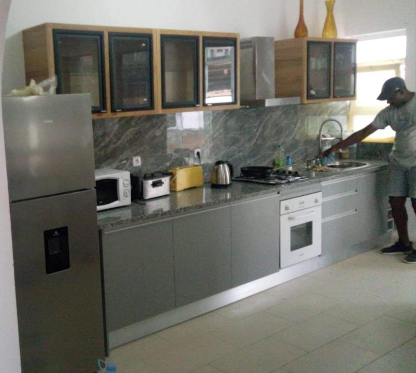 Kuchyň nebo kuchyňský kout v ubytování Maison Residencial casa de ferias