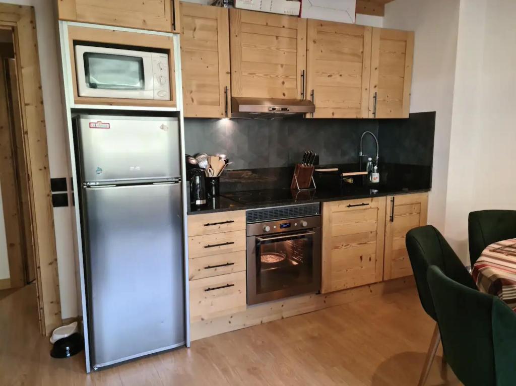 Kuchyň nebo kuchyňský kout v ubytování Cocoonabay Appartements