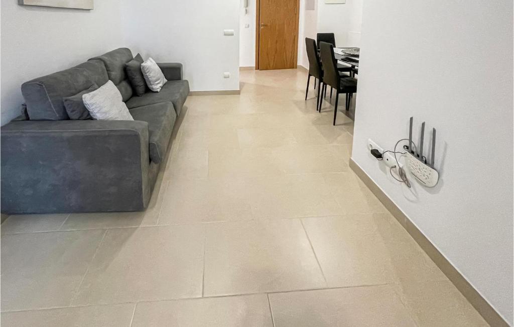 A seating area at Cozy Apartment In Estepona With Wifi