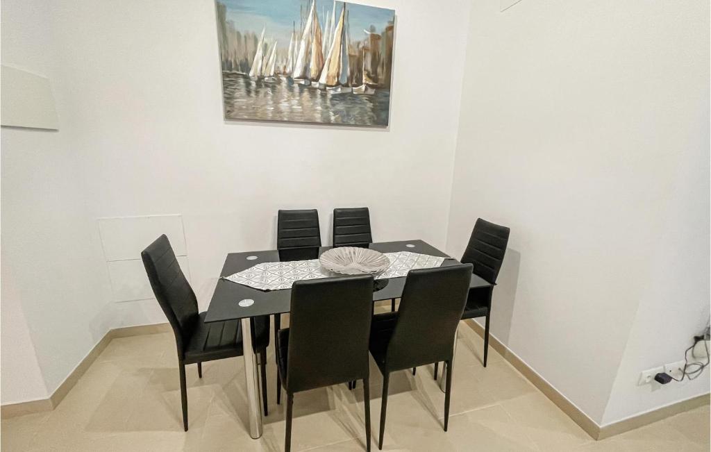A seating area at Cozy Apartment In Estepona With Wifi