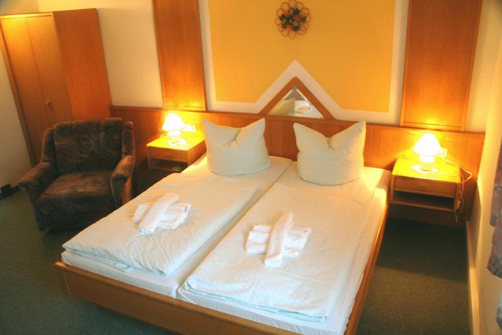 Postel nebo postele na pokoji v ubytování Hotel Asterra