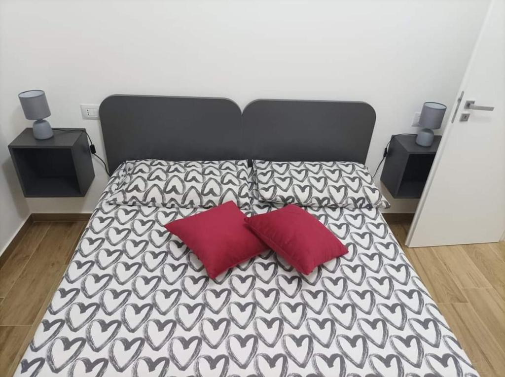 Кровать или кровати в номере Eraclea Minoa Apartments