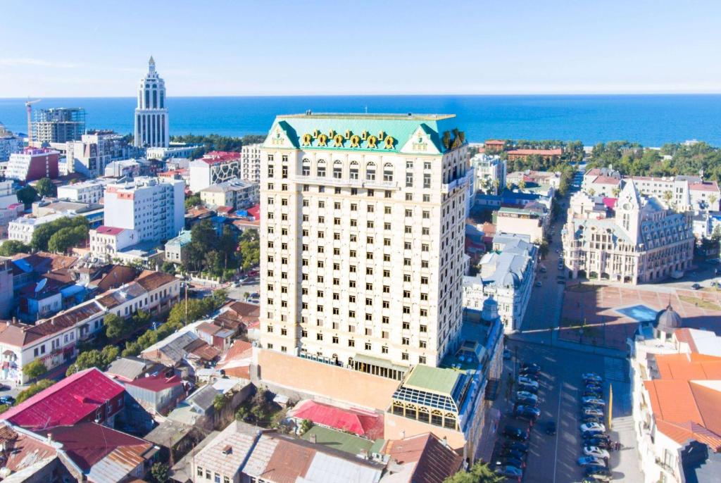 a building with a group of people on top of it at Wyndham Batumi in Batumi