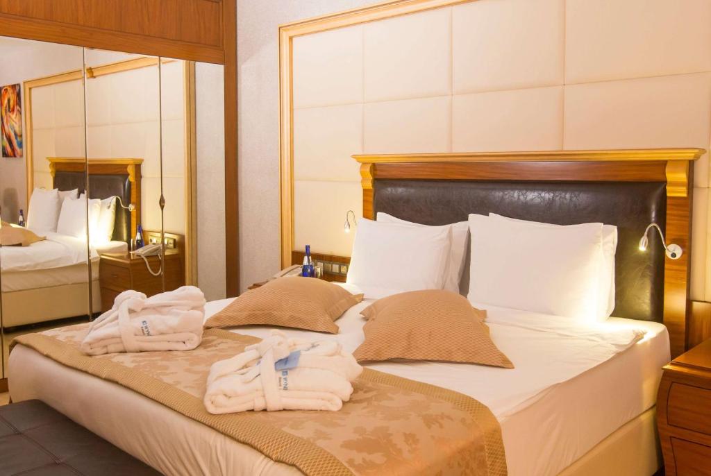 Postel nebo postele na pokoji v ubytování Wyndham Batumi