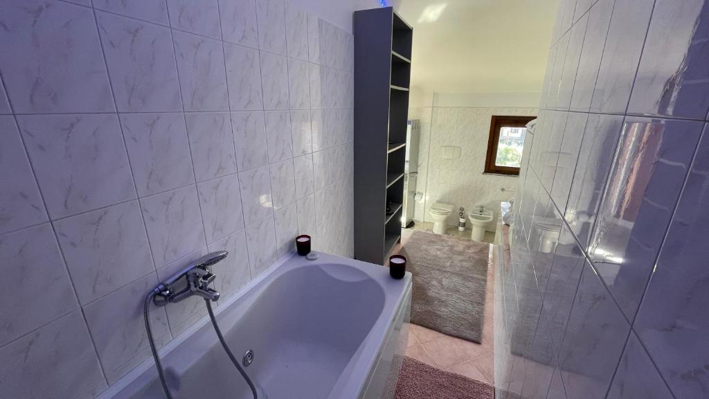 Koupelna v ubytování DeHomes - Relax & Business Apartments