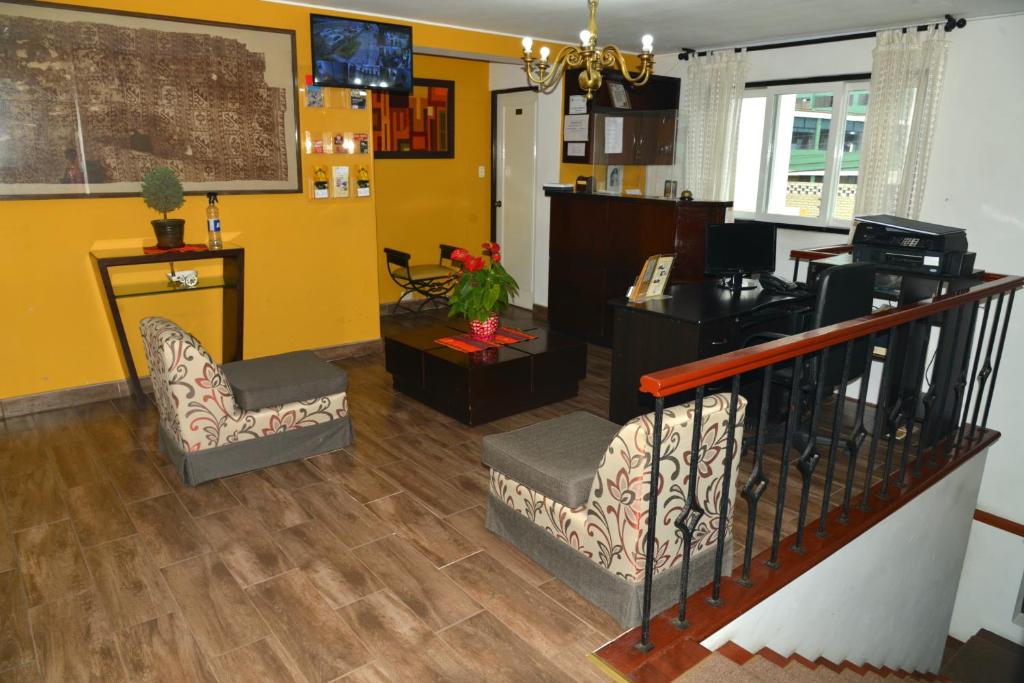 TV a/nebo společenská místnost v ubytování Residencial Carlos