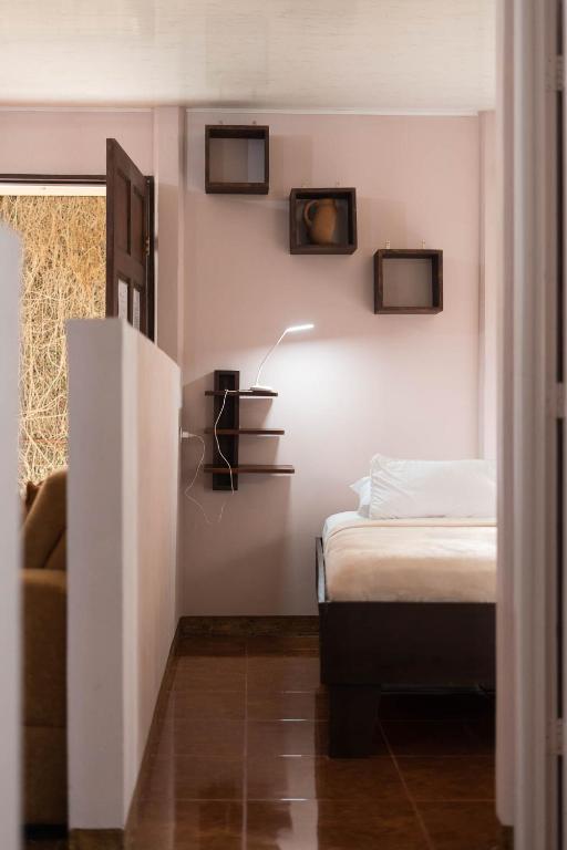 Postel nebo postele na pokoji v ubytování Cabañas del Rio