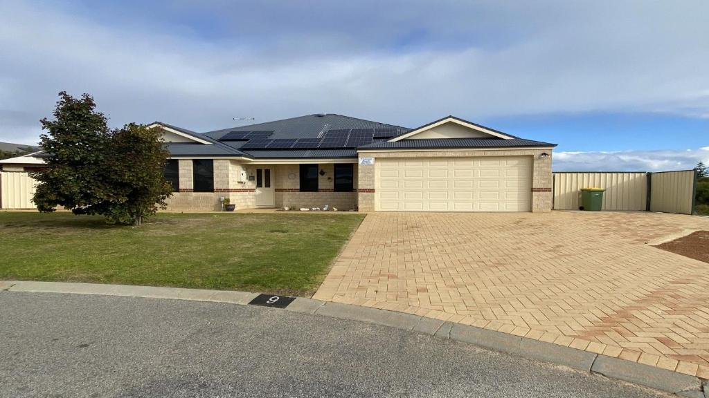 a house with solar panels on top of it at Maniki Gardens in Jurien Bay