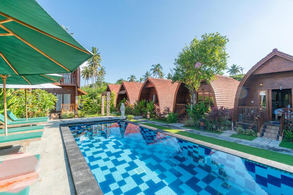 une image de la piscine d'une villa dans l'établissement Kukuh Penida Village, à Nusa Penida