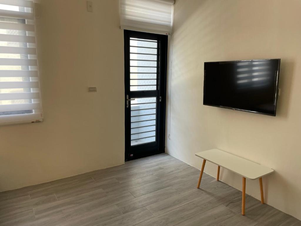 TV a/nebo společenská místnost v ubytování Wen Wen Sub BnB
