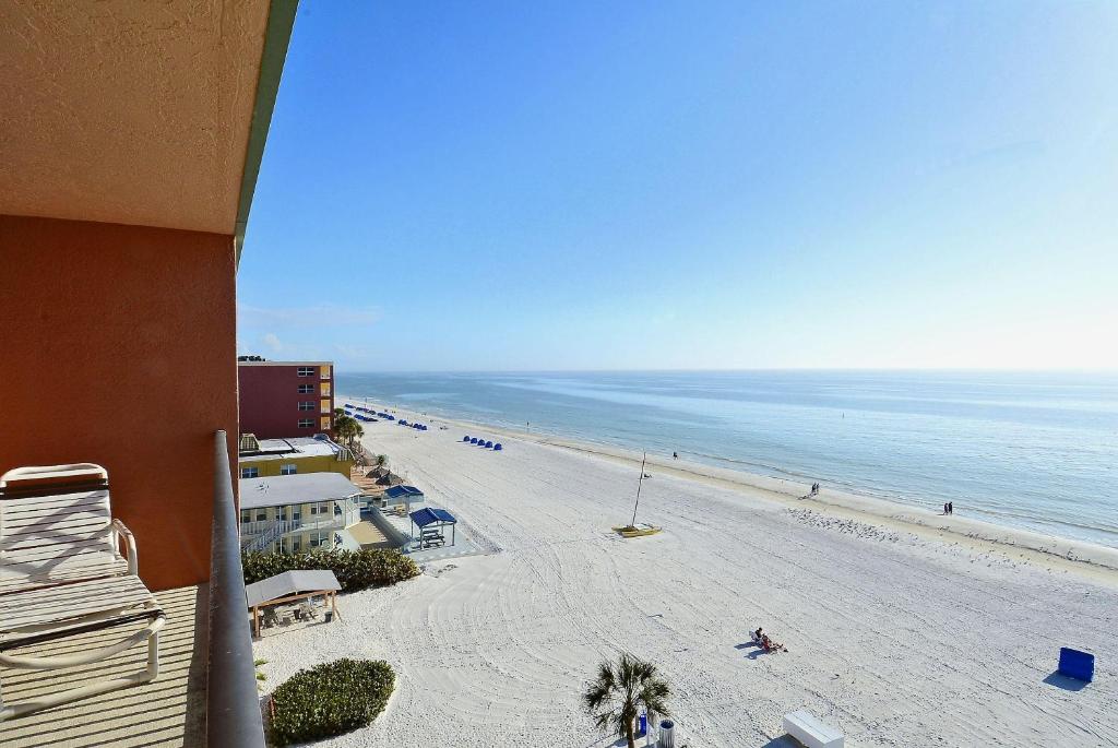 a view of the beach from a balcony of a condo at Emerald Isle 603 in St Pete Beach