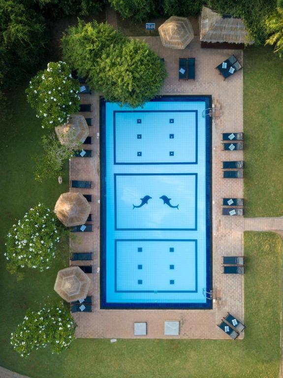 Bazén v ubytování Camellia Resort and Spa nebo v jeho okolí