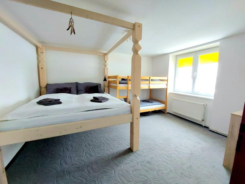 Posteľ alebo postele v izbe v ubytovaní Apartmán Meda