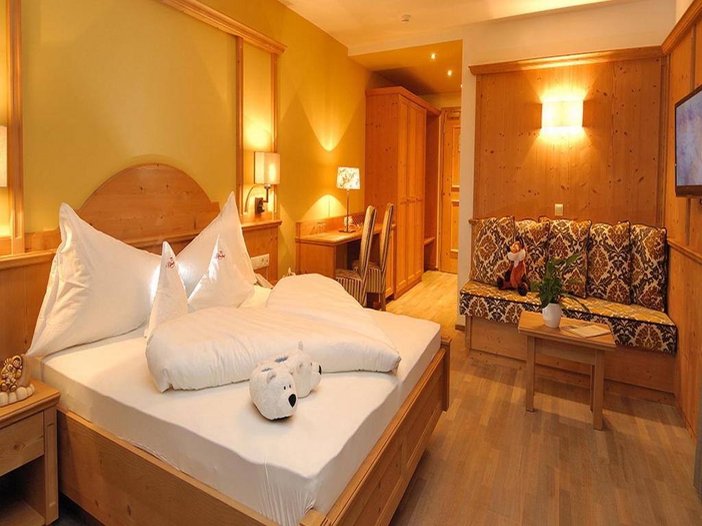 Posteľ alebo postele v izbe v ubytovaní Hotel Rosslaufhof