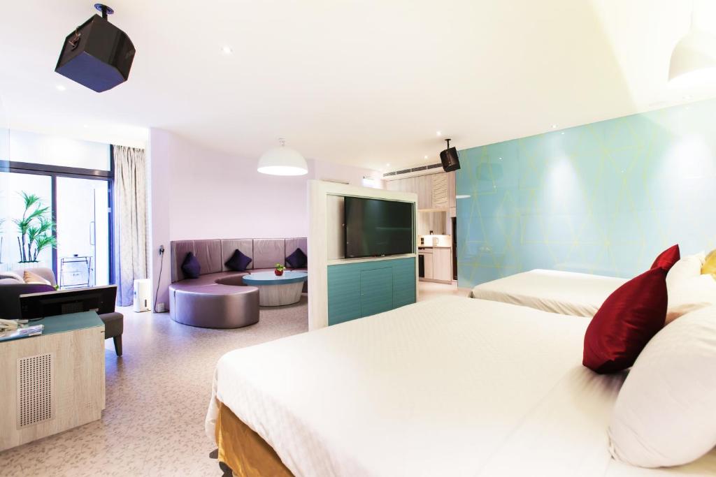 TV a/nebo společenská místnost v ubytování Six Star Motel-Zhongli