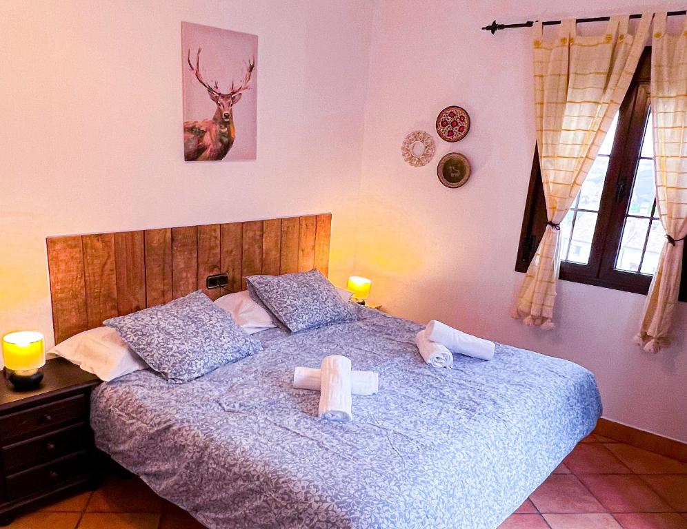 Postel nebo postele na pokoji v ubytování Grazalema- Casita Panorama - Fantastic views- Clima, Wi-Fi and Private Parking optional