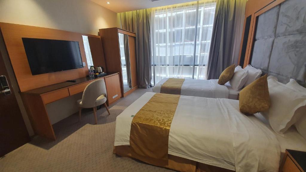 TV o dispositivi per l'intrattenimento presso Al Rayyan Tower