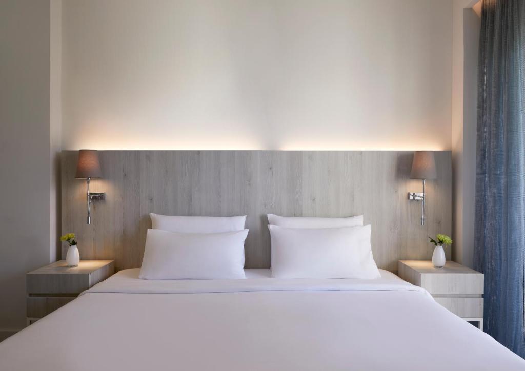 Posteľ alebo postele v izbe v ubytovaní Amus Hotel & Spa