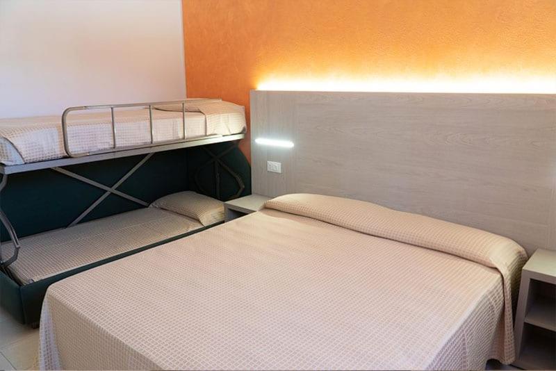 Postel nebo postele na pokoji v ubytování Hotel Cinzia
