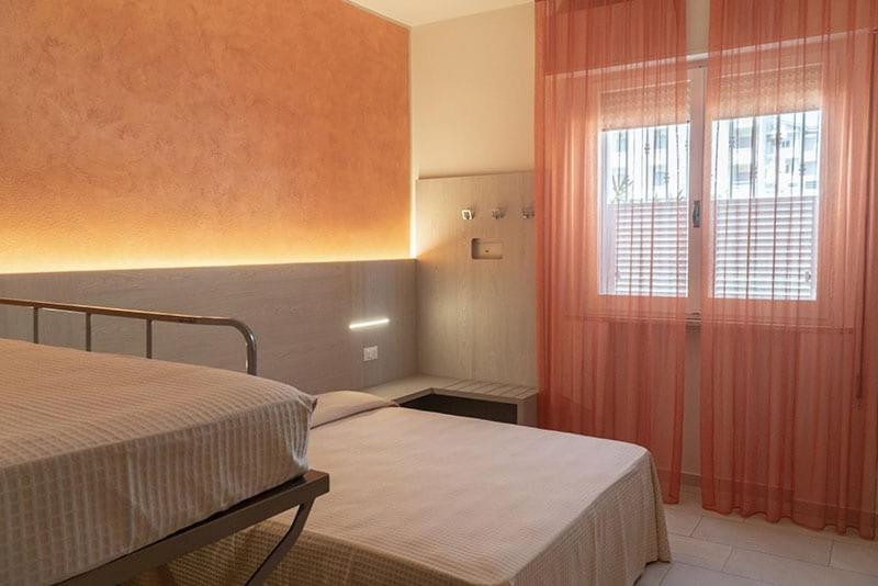 Postel nebo postele na pokoji v ubytování Hotel Cinzia