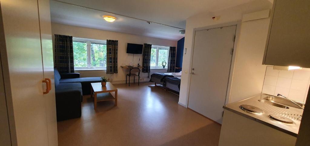 Kuchyň nebo kuchyňský kout v ubytování Nipanhotellet