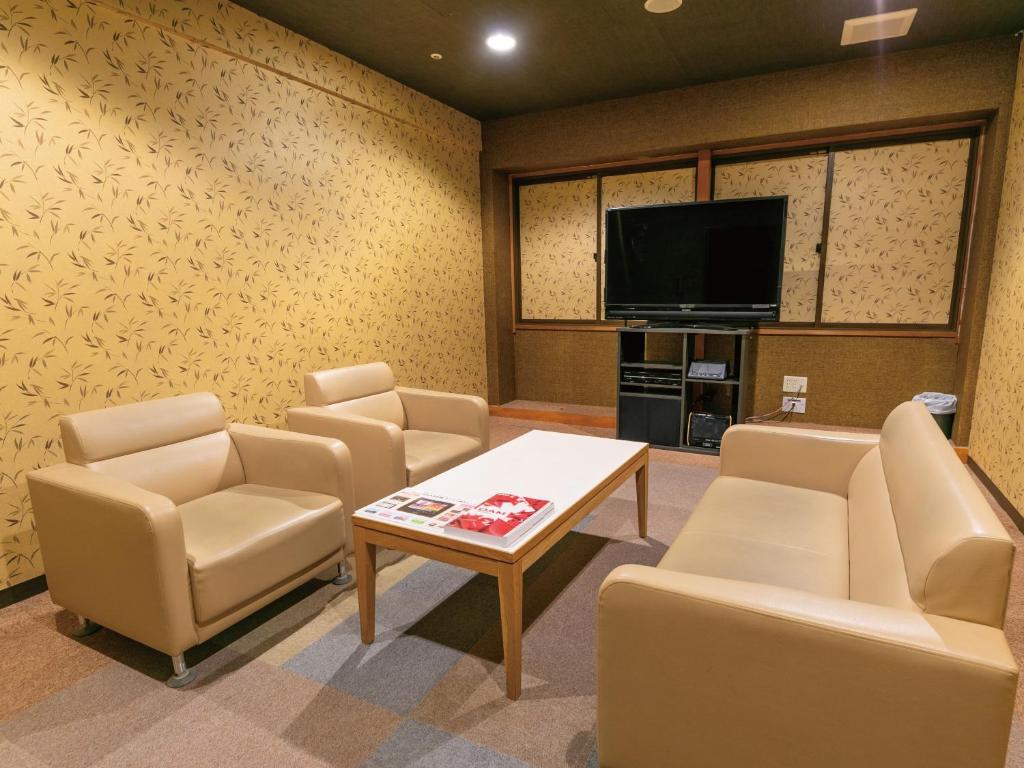 TV a/nebo společenská místnost v ubytování Atagawa Onsen Blue Ocean