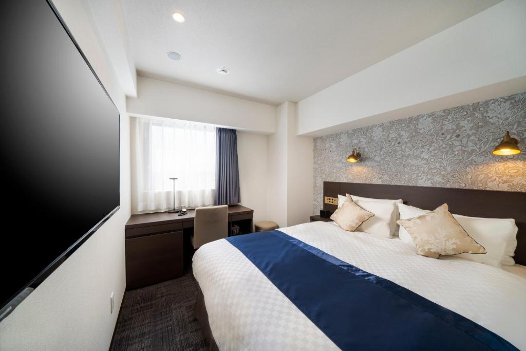 Postel nebo postele na pokoji v ubytování Best Western Hotel Fino Shin-Yokohama