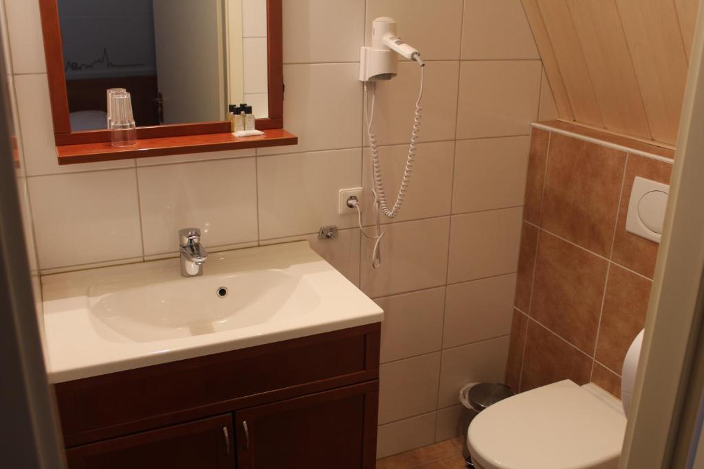 Koupelna v ubytování Hotel,cafe,biljart POT