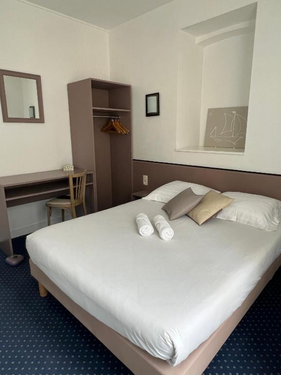 Posteľ alebo postele v izbe v ubytovaní HOTEL KAN AVEL