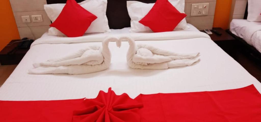 Voodi või voodid majutusasutuse Hotel Ranjit Residency toas
