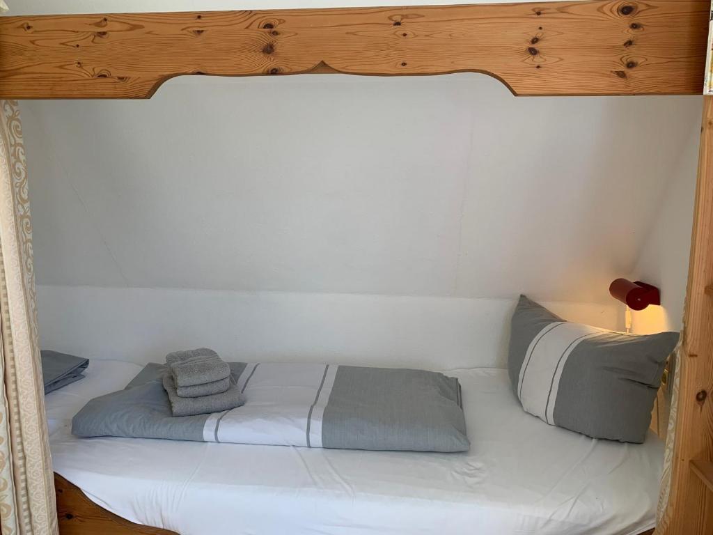 Postel nebo postele na pokoji v ubytování Ferienwohnung "Neptun" im Haus Tjark